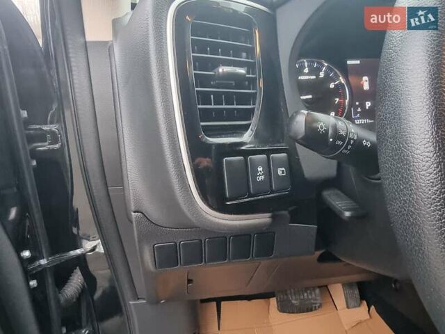 Черный Мицубиси Аутлендер, объемом двигателя 2.36 л и пробегом 127 тыс. км за 20800 $, фото 23 на Automoto.ua