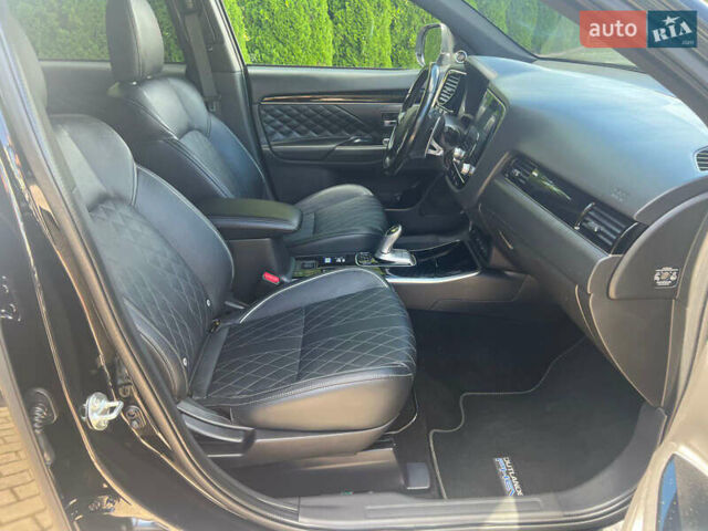 Чорний Міцубісі Аутлендер, об'ємом двигуна 2.36 л та пробігом 174 тис. км за 27800 $, фото 32 на Automoto.ua