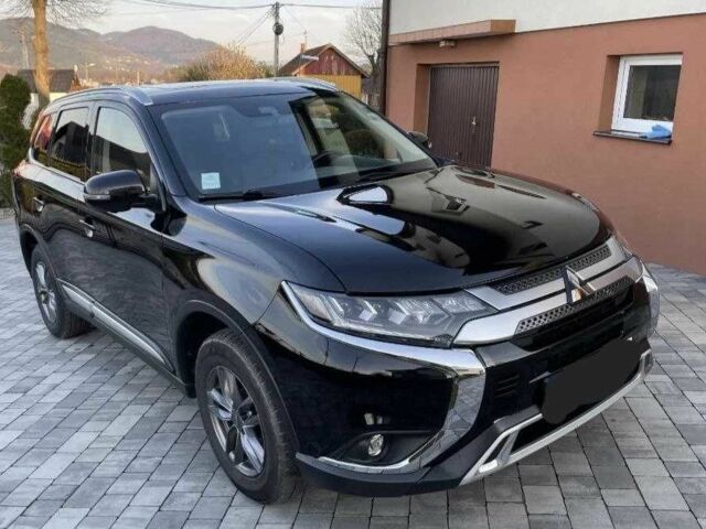 Черный Мицубиси Аутлендер, объемом двигателя 2.4 л и пробегом 1 тыс. км за 14400 $, фото 2 на Automoto.ua