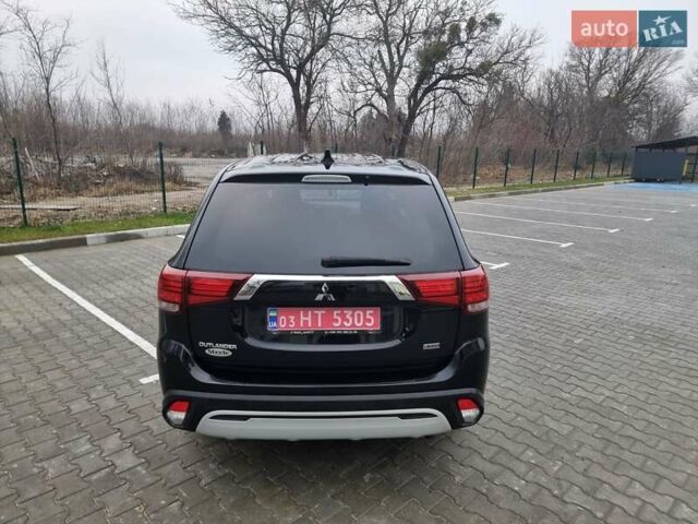 Черный Мицубиси Аутлендер, объемом двигателя 2.36 л и пробегом 127 тыс. км за 20800 $, фото 10 на Automoto.ua