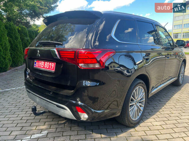 Чорний Міцубісі Аутлендер, об'ємом двигуна 2.36 л та пробігом 174 тис. км за 27800 $, фото 6 на Automoto.ua