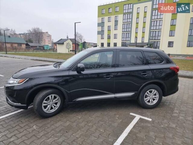 Черный Мицубиси Аутлендер, объемом двигателя 2.36 л и пробегом 127 тыс. км за 20800 $, фото 14 на Automoto.ua