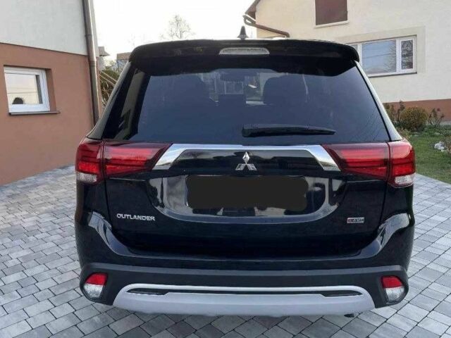 Черный Мицубиси Аутлендер, объемом двигателя 2.4 л и пробегом 1 тыс. км за 14400 $, фото 8 на Automoto.ua