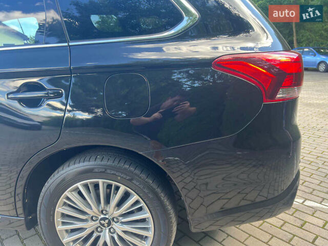 Чорний Міцубісі Аутлендер, об'ємом двигуна 2.36 л та пробігом 174 тис. км за 27800 $, фото 16 на Automoto.ua