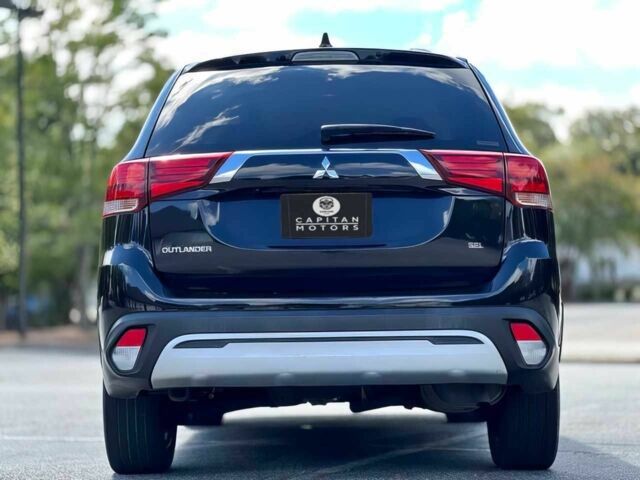 Черный Мицубиси Аутлендер, объемом двигателя 2.4 л и пробегом 46 тыс. км за 3000 $, фото 5 на Automoto.ua