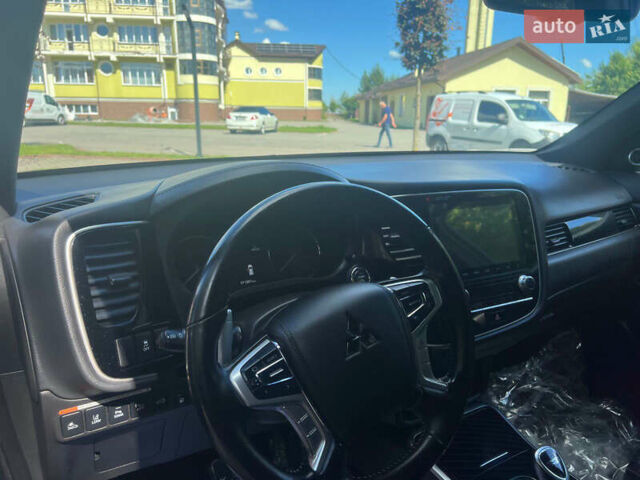 Чорний Міцубісі Аутлендер, об'ємом двигуна 2.36 л та пробігом 174 тис. км за 27800 $, фото 36 на Automoto.ua