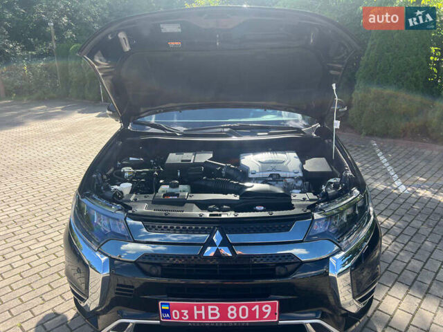Чорний Міцубісі Аутлендер, об'ємом двигуна 2.36 л та пробігом 174 тис. км за 27800 $, фото 45 на Automoto.ua