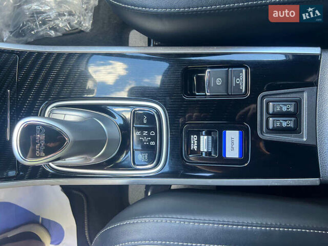 Чорний Міцубісі Аутлендер, об'ємом двигуна 2.36 л та пробігом 174 тис. км за 27800 $, фото 39 на Automoto.ua