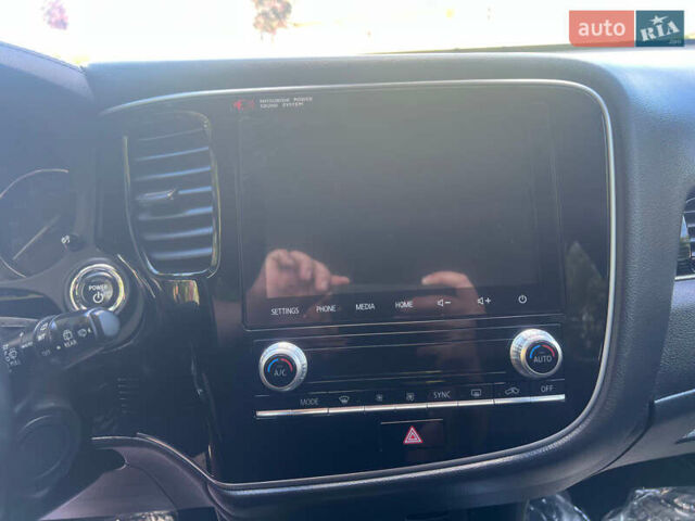 Чорний Міцубісі Аутлендер, об'ємом двигуна 2.36 л та пробігом 174 тис. км за 27800 $, фото 38 на Automoto.ua