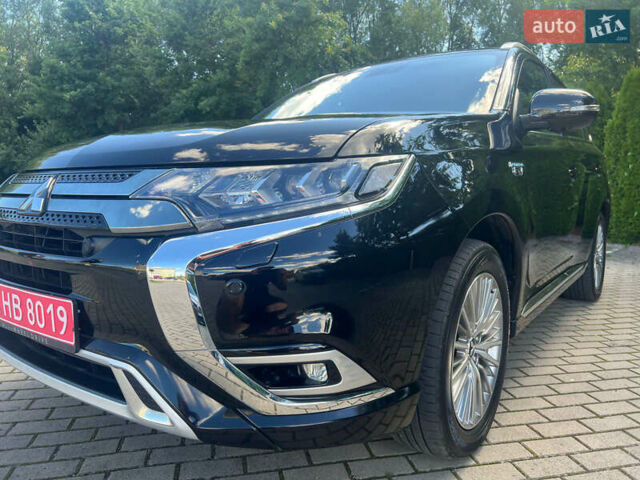 Чорний Міцубісі Аутлендер, об'ємом двигуна 2.36 л та пробігом 174 тис. км за 27800 $, фото 9 на Automoto.ua