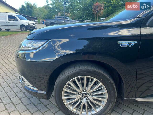 Чорний Міцубісі Аутлендер, об'ємом двигуна 2.36 л та пробігом 174 тис. км за 27800 $, фото 13 на Automoto.ua