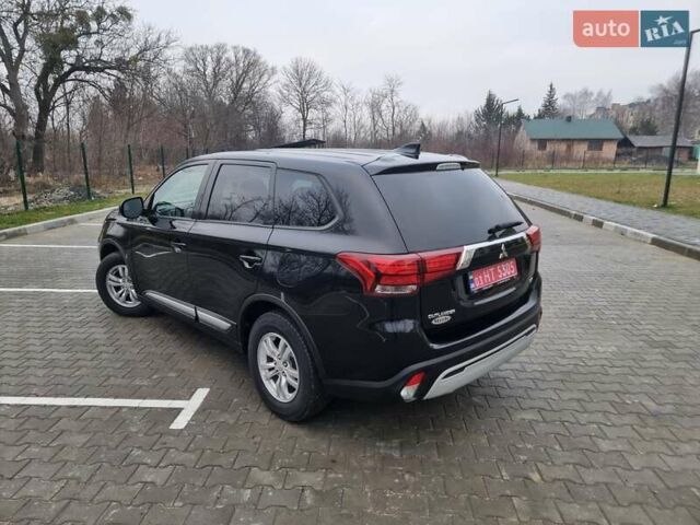 Черный Мицубиси Аутлендер, объемом двигателя 2.36 л и пробегом 127 тыс. км за 20800 $, фото 11 на Automoto.ua