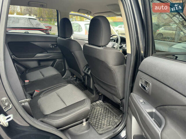 Черный Мицубиси Аутлендер, объемом двигателя 2.4 л и пробегом 44 тыс. км за 18700 $, фото 11 на Automoto.ua