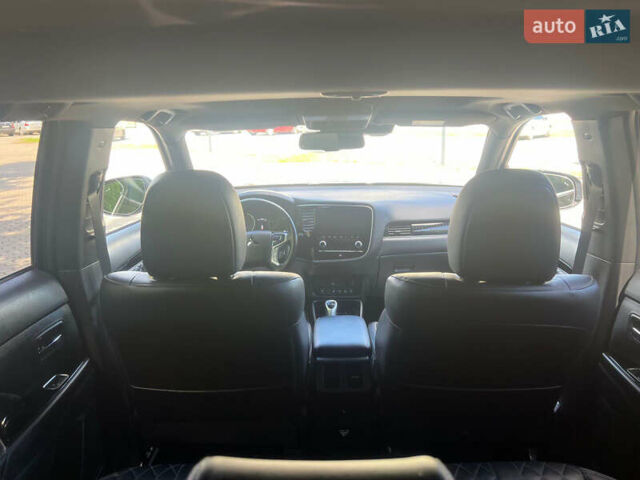 Чорний Міцубісі Аутлендер, об'ємом двигуна 2.36 л та пробігом 174 тис. км за 27800 $, фото 43 на Automoto.ua