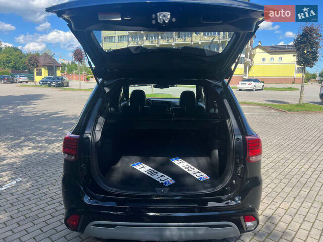 Чорний Міцубісі Аутлендер, об'ємом двигуна 2.36 л та пробігом 174 тис. км за 27800 $, фото 41 на Automoto.ua