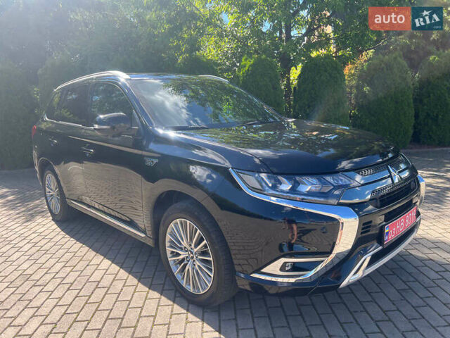 Чорний Міцубісі Аутлендер, об'ємом двигуна 2.36 л та пробігом 174 тис. км за 27800 $, фото 1 на Automoto.ua