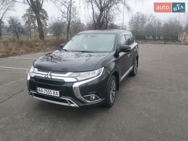 Черный Мицубиси Аутлендер, объемом двигателя 2.4 л и пробегом 81 тыс. км за 20900 $, фото 2 на Automoto.ua