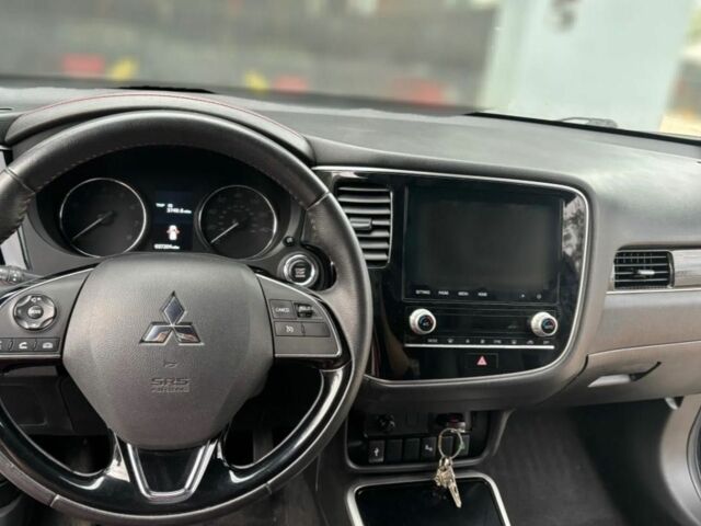 Черный Мицубиси Аутлендер, объемом двигателя 2.4 л и пробегом 38 тыс. км за 14000 $, фото 11 на Automoto.ua