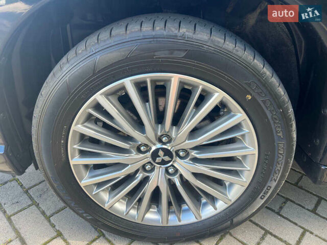 Чорний Міцубісі Аутлендер, об'ємом двигуна 2.36 л та пробігом 174 тис. км за 27800 $, фото 51 на Automoto.ua