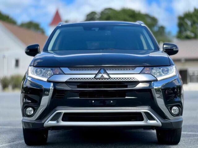 Черный Мицубиси Аутлендер, объемом двигателя 2.4 л и пробегом 46 тыс. км за 3000 $, фото 1 на Automoto.ua