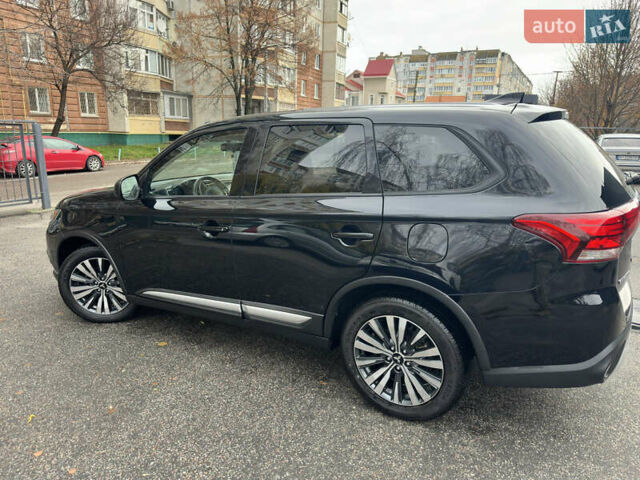 Черный Мицубиси Аутлендер, объемом двигателя 2.4 л и пробегом 44 тыс. км за 18700 $, фото 6 на Automoto.ua