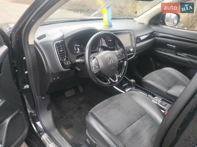 Черный Мицубиси Аутлендер, объемом двигателя 2.4 л и пробегом 81 тыс. км за 20900 $, фото 6 на Automoto.ua