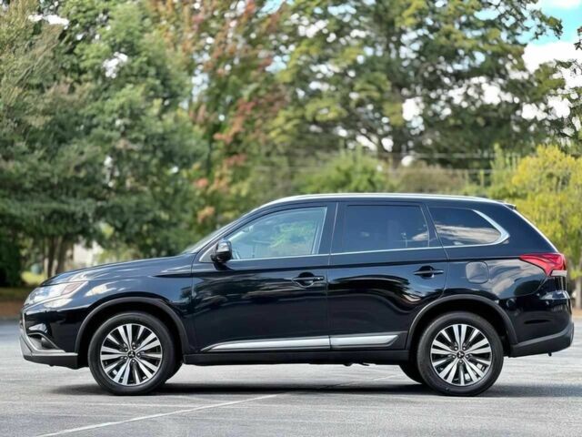 Черный Мицубиси Аутлендер, объемом двигателя 2.4 л и пробегом 46 тыс. км за 3000 $, фото 3 на Automoto.ua