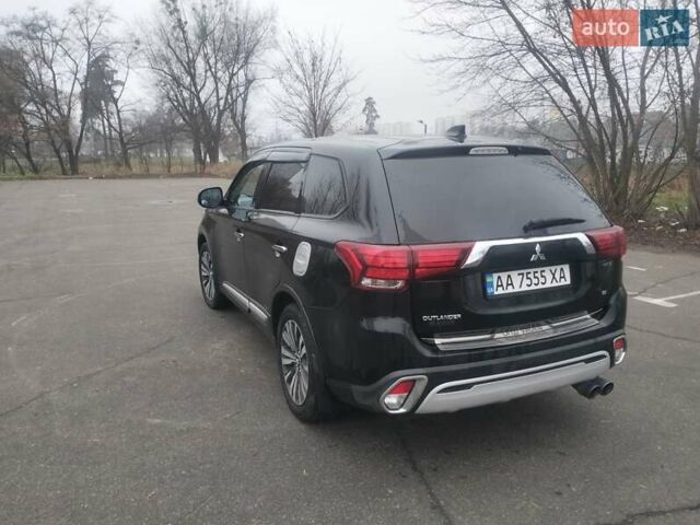 Черный Мицубиси Аутлендер, объемом двигателя 2.4 л и пробегом 81 тыс. км за 20900 $, фото 4 на Automoto.ua