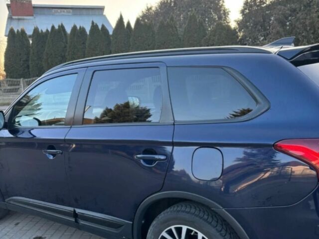 Черный Мицубиси Аутлендер, объемом двигателя 2.4 л и пробегом 38 тыс. км за 14000 $, фото 3 на Automoto.ua