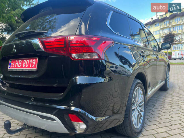 Чорний Міцубісі Аутлендер, об'ємом двигуна 2.36 л та пробігом 174 тис. км за 27800 $, фото 12 на Automoto.ua