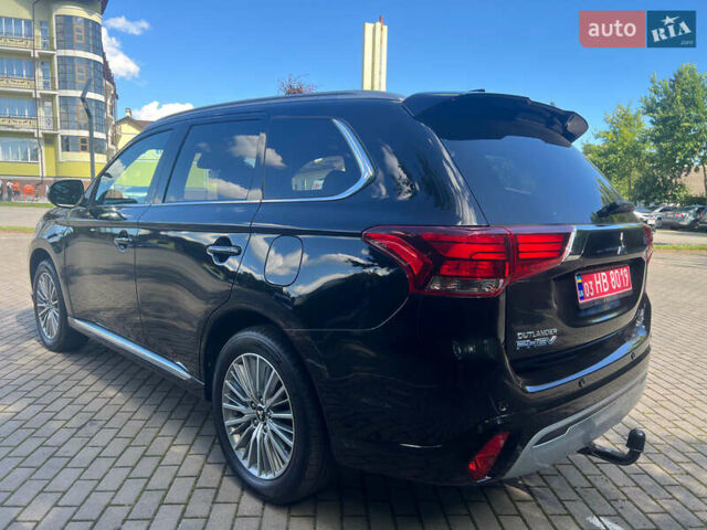 Чорний Міцубісі Аутлендер, об'ємом двигуна 2.36 л та пробігом 174 тис. км за 27800 $, фото 4 на Automoto.ua
