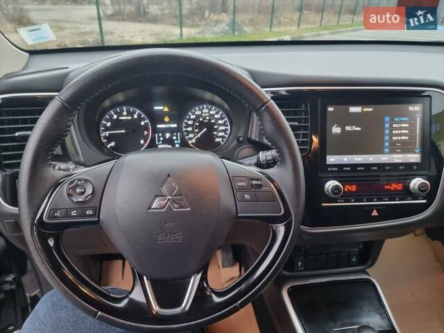 Черный Мицубиси Аутлендер, объемом двигателя 2.36 л и пробегом 127 тыс. км за 20800 $, фото 27 на Automoto.ua