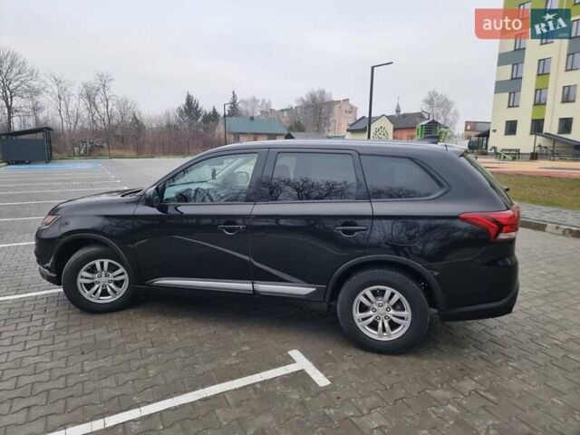 Черный Мицубиси Аутлендер, объемом двигателя 2.36 л и пробегом 127 тыс. км за 20800 $, фото 15 на Automoto.ua