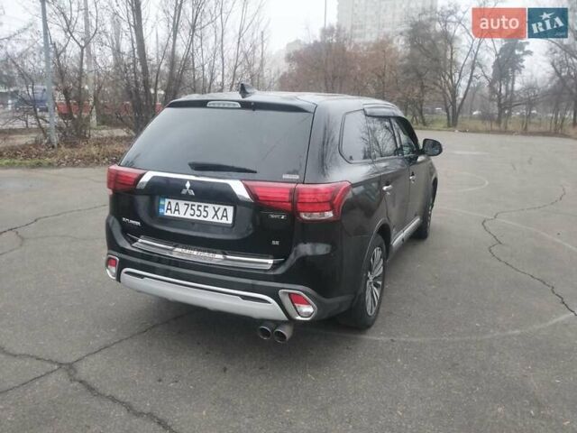 Черный Мицубиси Аутлендер, объемом двигателя 2.4 л и пробегом 81 тыс. км за 20900 $, фото 5 на Automoto.ua