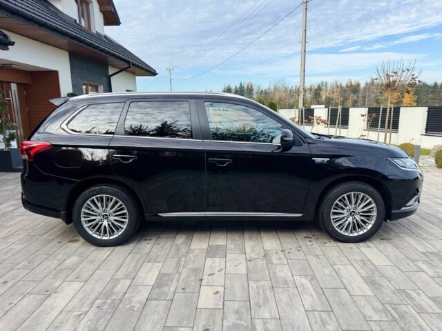 Чорний Міцубісі Аутлендер, об'ємом двигуна 2.4 л та пробігом 37 тис. км за 6500 $, фото 7 на Automoto.ua