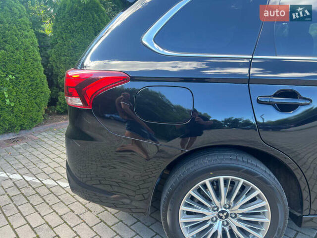 Чорний Міцубісі Аутлендер, об'ємом двигуна 2.36 л та пробігом 174 тис. км за 27800 $, фото 17 на Automoto.ua