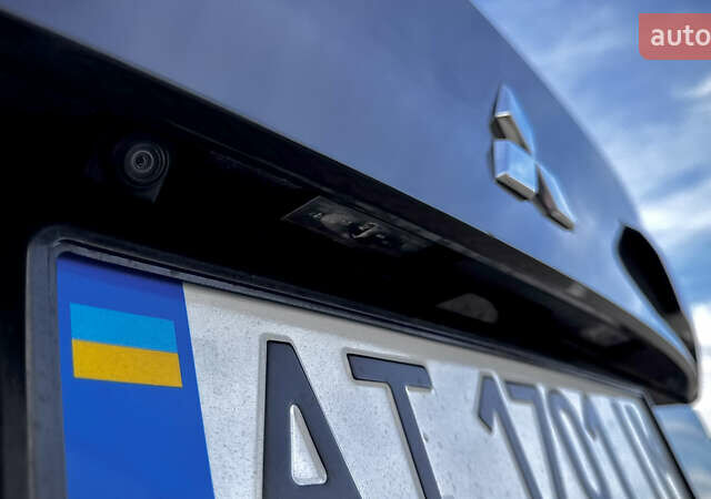 Чорний Міцубісі Аутлендер, об'ємом двигуна 2.49 л та пробігом 120 тис. км за 28500 $, фото 25 на Automoto.ua