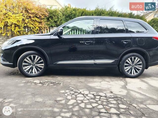 Черный Мицубиси Аутлендер, объемом двигателя 2.36 л и пробегом 50 тыс. км за 21000 $, фото 23 на Automoto.ua