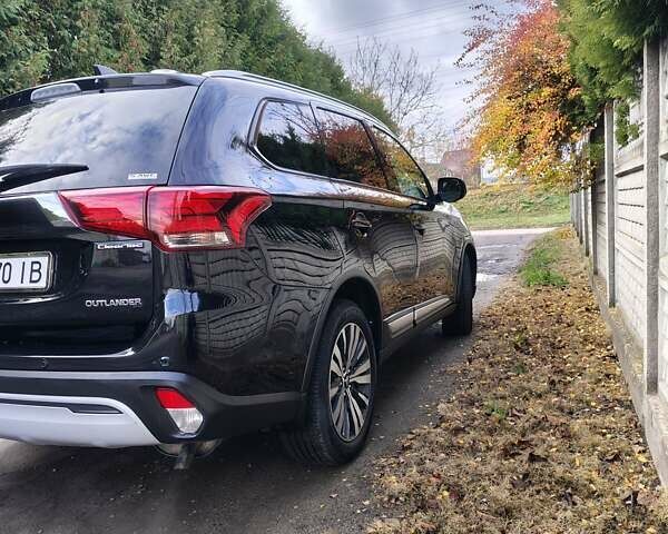 Черный Мицубиси Аутлендер, объемом двигателя 2.36 л и пробегом 50 тыс. км за 21000 $, фото 7 на Automoto.ua