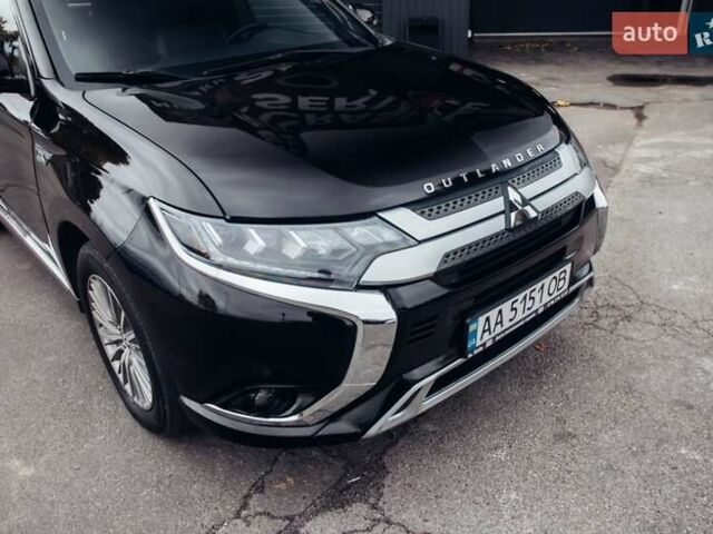 Черный Мицубиси Аутлендер, объемом двигателя 2.36 л и пробегом 110 тыс. км за 28900 $, фото 7 на Automoto.ua