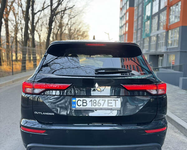 Черный Мицубиси Аутлендер, объемом двигателя 2.49 л и пробегом 56 тыс. км за 25900 $, фото 4 на Automoto.ua