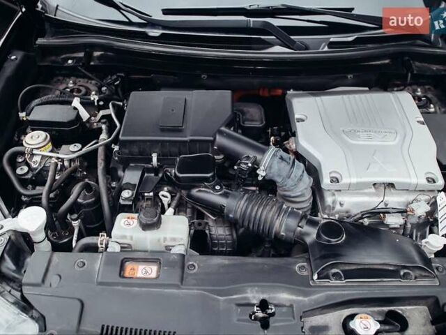 Черный Мицубиси Аутлендер, объемом двигателя 2.36 л и пробегом 110 тыс. км за 28900 $, фото 22 на Automoto.ua