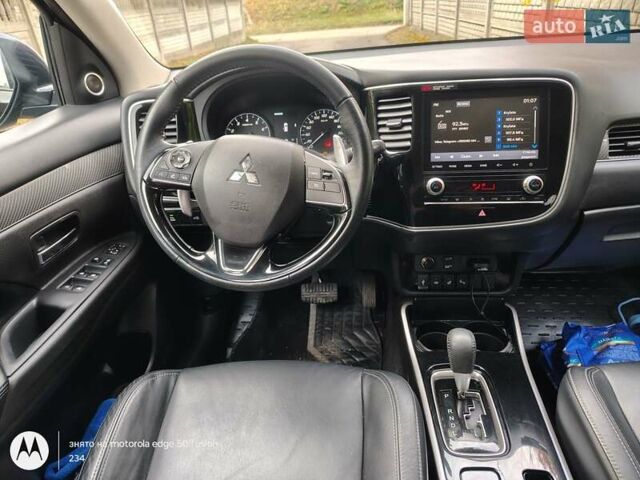 Черный Мицубиси Аутлендер, объемом двигателя 2.36 л и пробегом 50 тыс. км за 21000 $, фото 12 на Automoto.ua