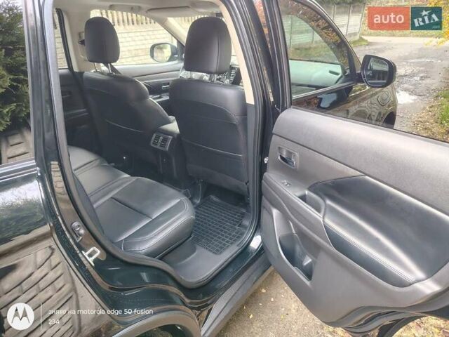 Черный Мицубиси Аутлендер, объемом двигателя 2.36 л и пробегом 50 тыс. км за 21000 $, фото 13 на Automoto.ua