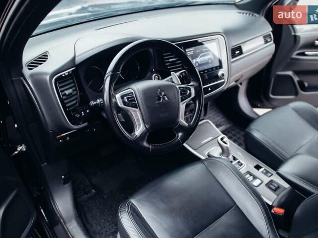 Черный Мицубиси Аутлендер, объемом двигателя 2.36 л и пробегом 110 тыс. км за 28900 $, фото 15 на Automoto.ua