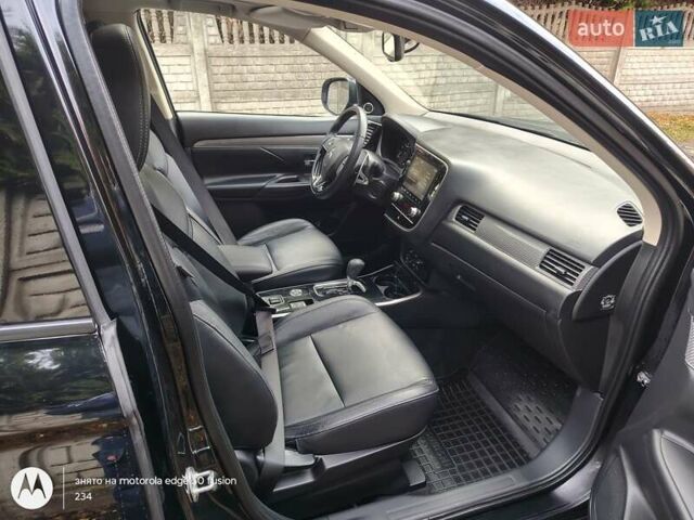 Черный Мицубиси Аутлендер, объемом двигателя 2.36 л и пробегом 50 тыс. км за 21000 $, фото 16 на Automoto.ua