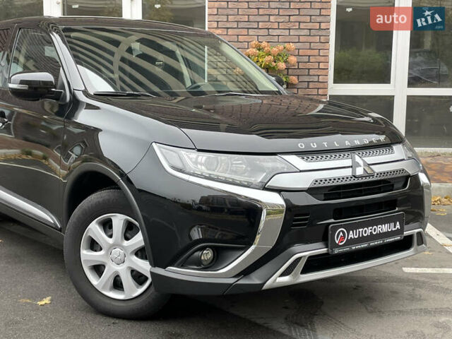 Мицубиси Аутлендер 2021 в Киеве на Automoto.ua Черный Мицубиси Аутлендер, объемом двигателя 2 л и пробегом 111 тыс. км за 18490 $, фото 1 на Automoto.ua