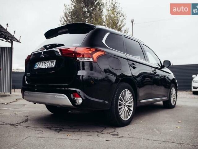 Черный Мицубиси Аутлендер, объемом двигателя 2.36 л и пробегом 110 тыс. км за 28900 $, фото 5 на Automoto.ua