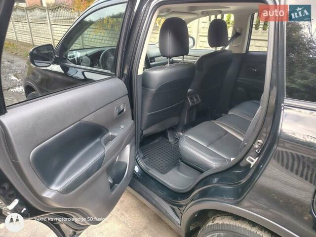 Черный Мицубиси Аутлендер, объемом двигателя 2.36 л и пробегом 50 тыс. км за 21000 $, фото 8 на Automoto.ua