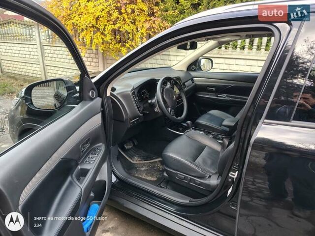 Черный Мицубиси Аутлендер, объемом двигателя 2.36 л и пробегом 50 тыс. км за 21000 $, фото 9 на Automoto.ua